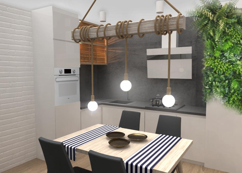 Nowoczesna kuchnia z drewnianym stołem, czarnymi krzesłami i unikalną lampą wiszącą z drewnianej belki owiniętej sznurem, oświetlającej trzy talerze. W tle białe szafki kuchenne, ceglana ściana...