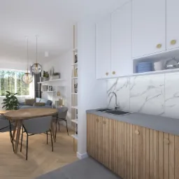 Wnętrze mieszkania: kuchnia z drewnianymi szafkami i marmurowym backsplashiem, otwarta na salon z okrągłym stołem i szarą sofą. Parkiet ułożony w jodełkę.