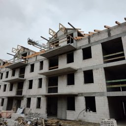 Budowa stanu surowego otwartego dwóch budynków mieszkalnych wielorodzinnych - Józefów, ul. Rejtana - 2025/2026 rok