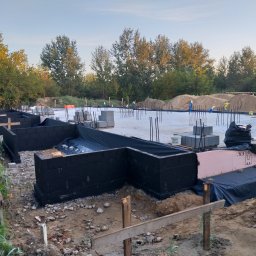 Budowa stanu surowego otwartego czterech budynków mieszkalnych w zabudowie szeregowej - Warszawa, ul. Ligustrowa - 2021/2022 rok