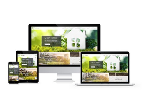 Responsywna strona internetowa Green Homes wyświetlana na monitorze, laptopie, tablecie i smartfonie, z motywem ekologicznym i ikoną domu.