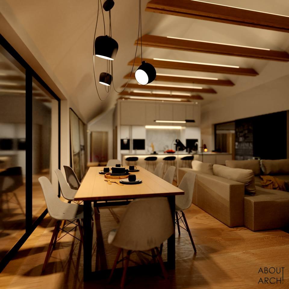 Nowoczesne wnętrze domu z otwartą kuchnią, jadalnią z drewnianym stołem i minimalistycznymi krzesłami, wiszące lampy kuliste i drewniane belki z oświetleniem LED na suficie.