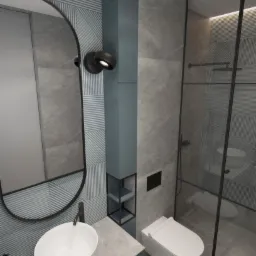 Wizualizacja nowoczesnej łazienki z owalnym lustrem w czarnej ramie, umywalką nablatową, toaletą podwieszaną i kabiną prysznicową ze szklanymi drzwiami oraz geometrycznymi wzorami na ścianach.