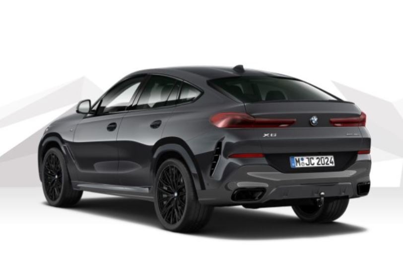 Grafitowy SUV marki BMW X6 z czarnymi felgami, widok z tyłu, tablica rejestracyjna M JC 2024.