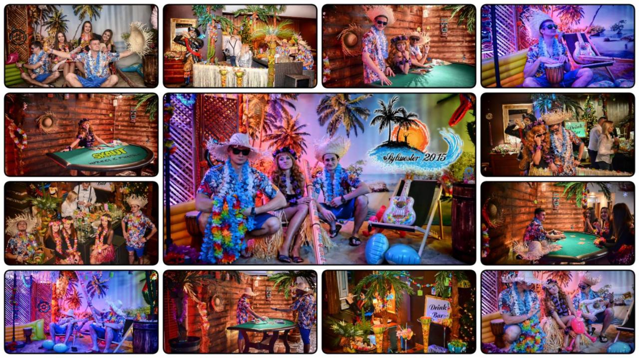 Zestaw zdjęć z imprezy tematycznej w stylu hawajskim: goście w kwiatowych lei, słomkowych kapeluszach, kolorowych koszulach, dekoracje z palmami, drink bar, gra w karty przy stole z zielonym suknem.