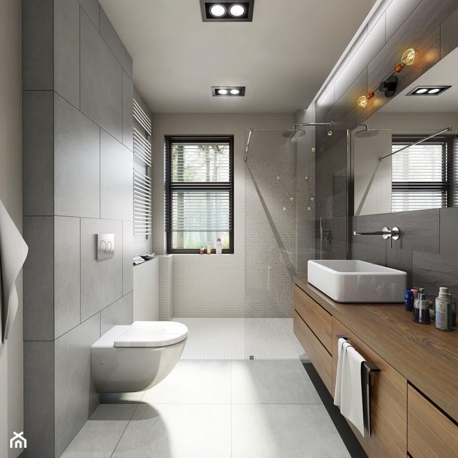 Nowoczesna łazienka w odcieniach szarości z drewnianą szafką pod umywalką, kabiną prysznicową typu walk-in i podwieszaną toaletą.