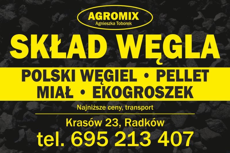 Żółto-czarny szyld reklamowy składu opału z informacją o ofercie: polski węgiel, pellet, miał, ekogroszek oraz danymi kontaktowymi.
