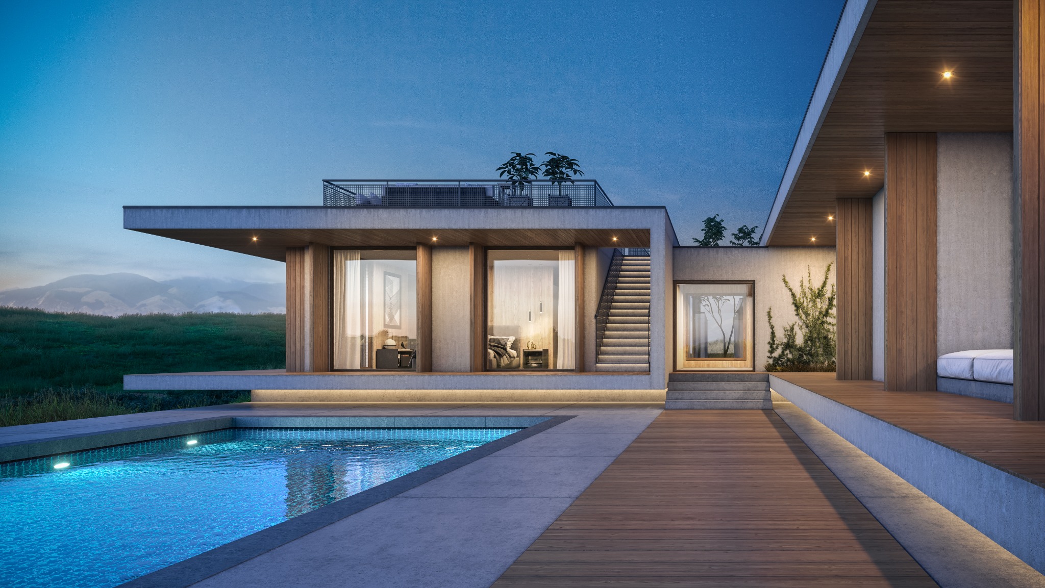 Nowoczesny dom z płaskim dachem i basenem oświetlonym punktowymi lampami, widok na góry w tle, drewniany taras i schody zewnętrzne.