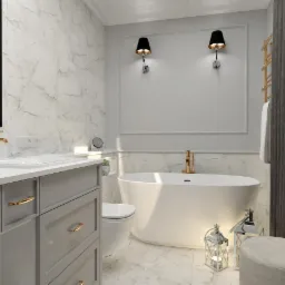 Elegancka łazienka z marmurowymi ścianami, owalną wanną wolnostojącą, szarą szafką pod umywalką z złotymi uchwytami i dekoracyjnymi lampionami na podłodze.