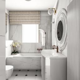 YOR - Elegancka, biała łazienka z marmurowymi płytkami, owalnym lustrem z dekoracyjną ramą, brązową armaturą i subtelnymi akcentami kwiatowymi.