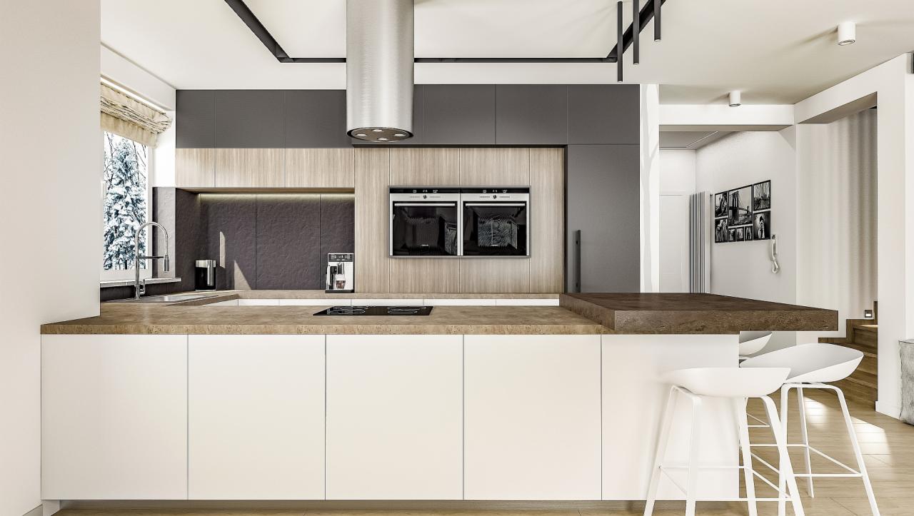 Minimalistyczna kuchnia z białymi szafkami, drewnianymi akcentami i szarymi górnymi szafkami, z dwoma piekarnikami w zabudowie i wyspą z białymi hokerami, widok na zaśnieżone drzewa za oknem.