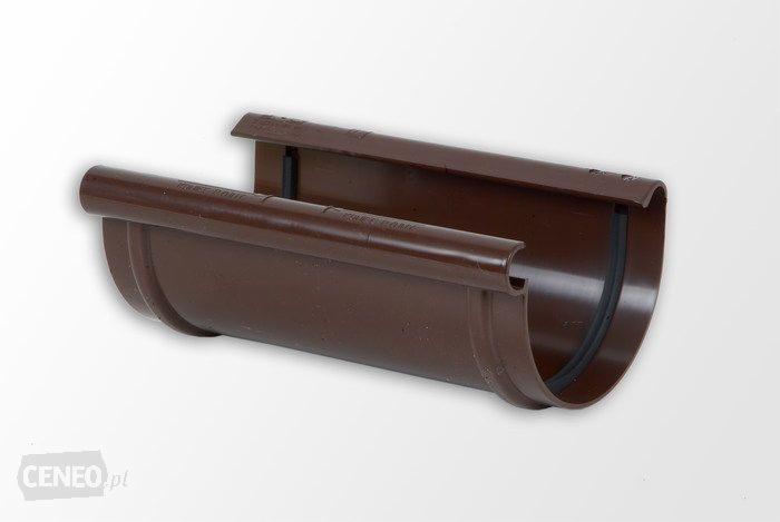 Brązowa rynna z tworzywa sztucznego, profil półokrągły, widoczne mocowanie i uszczelka, na jasnym tle.