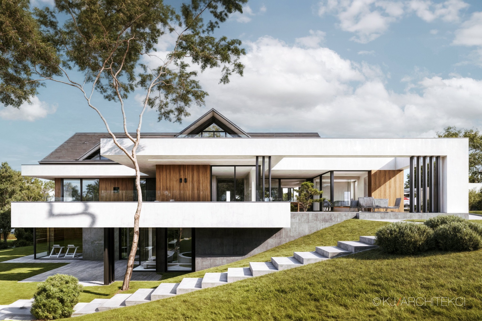 Dwukondygnacyjny, nowoczesny dom z białymi elewacjami i drewnianymi akcentami, z dużymi przeszkleniami, otoczony zielonym trawnikiem i schodami z betonu, z drzewem na pierwszym planie.
