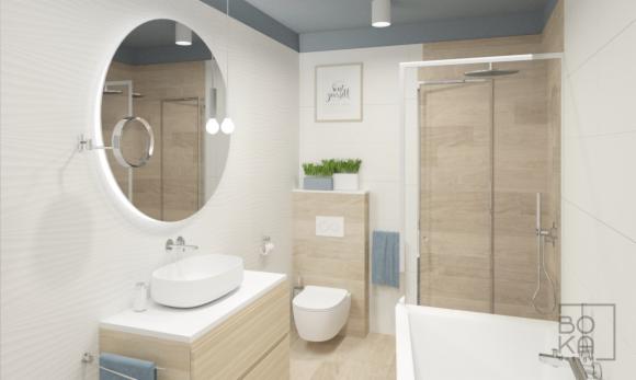 Nowoczesna łazienka z owalnym lustrem podświetlanym LED, umywalką nablatową, kabiną prysznicową z drewnopodobnymi płytkami i akcentami w kolorze jasnego drewna.