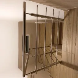 Nowoczesna balustrada ze stali nierdzewnej z pionowymi prętami, zamontowana przy schodach wyłożonych płytkami imitującymi drewno, widok z dołu.