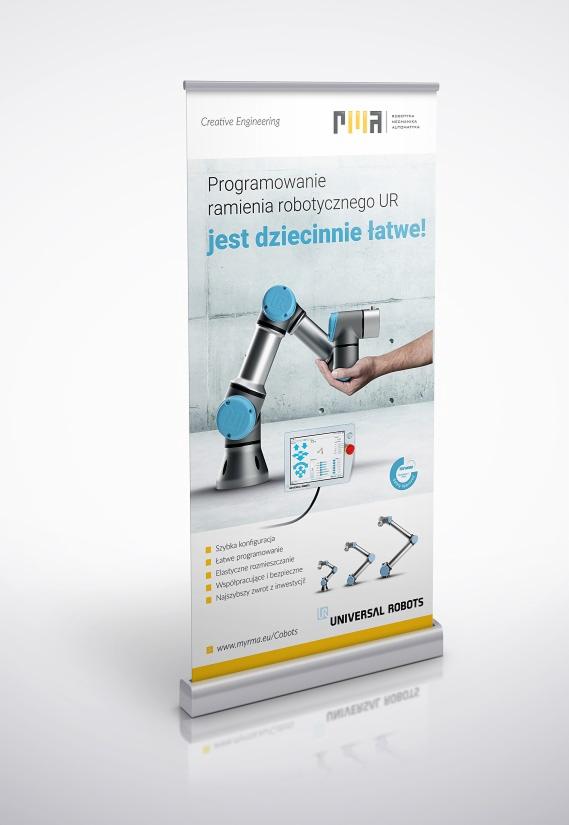 Roll-up reklamowy prezentujący ramię robotyczne Universal Robots z hasłem 'Programowanie ramienia robotycznego UR jest dziecinnie łatwe!', pokazujący łatwość obsługi i programowania robotów...