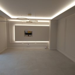 Salon, ścianka TV, oświetlenie LED.
Dom jednorodzinny, realizacja według projektu architekta.