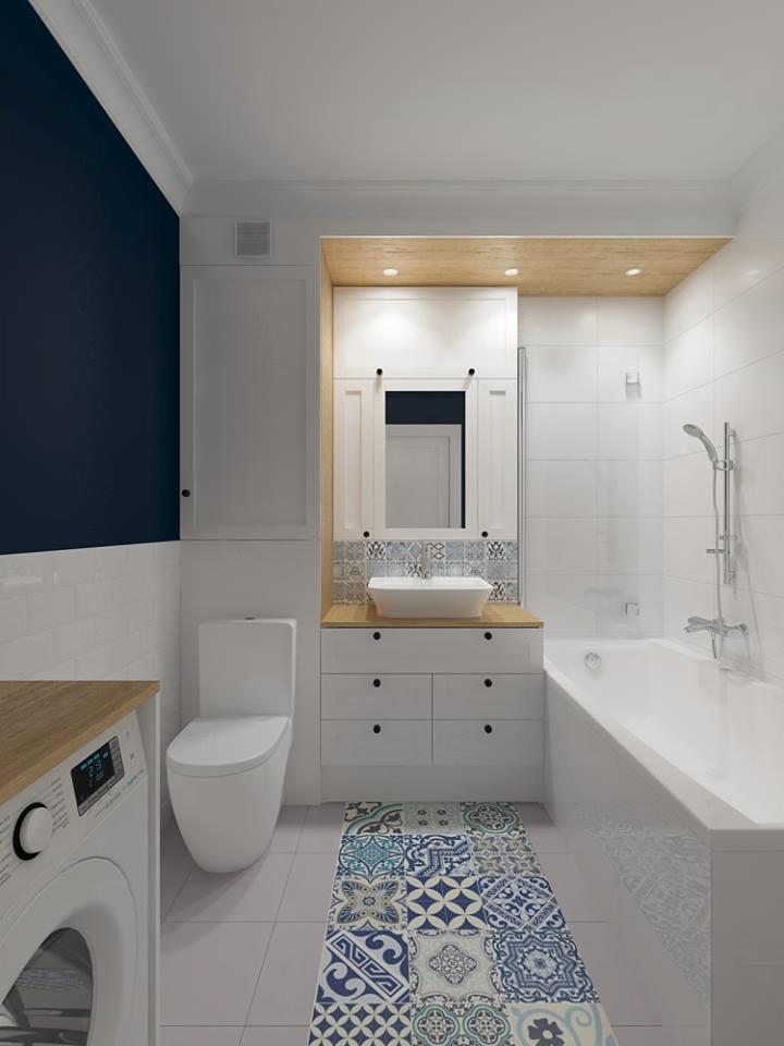 Wizualizacja łazienki z białą armaturą, szafką umywalkową z drewnianym blatem, wzorzystymi płytkami podłogowymi i akcentem granatowej ściany.