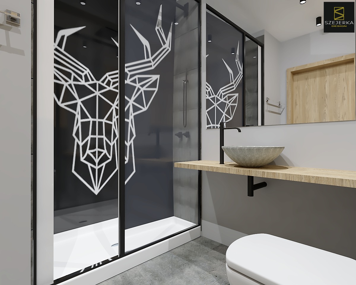 Nowoczesna łazienka z kabiną prysznicową ozdobioną geometrycznym wzorem głowy jelenia, umywalką w kształcie misy z kamienia i drewnianym blatem.