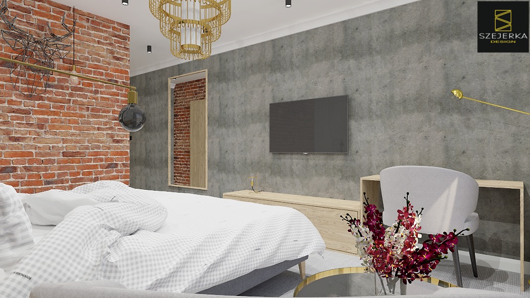 Nowoczesna sypialnia z ceglaną ścianą, designerską lampą i złotym żyrandolem, szara ściana z telewizorem, drewniana komoda, biurko z krzesłem i bukiet kwiatów na stoliku kawowym.