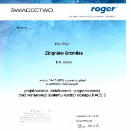 Skan świadectwa ukończenia szkolenia z projektowania, instalowania, programowania i konserwacji systemu kontroli dostępu RACS 5, wydanego przez firmę Roger dla Zbigniewa Grzmilasa z D.N. Serwis.
