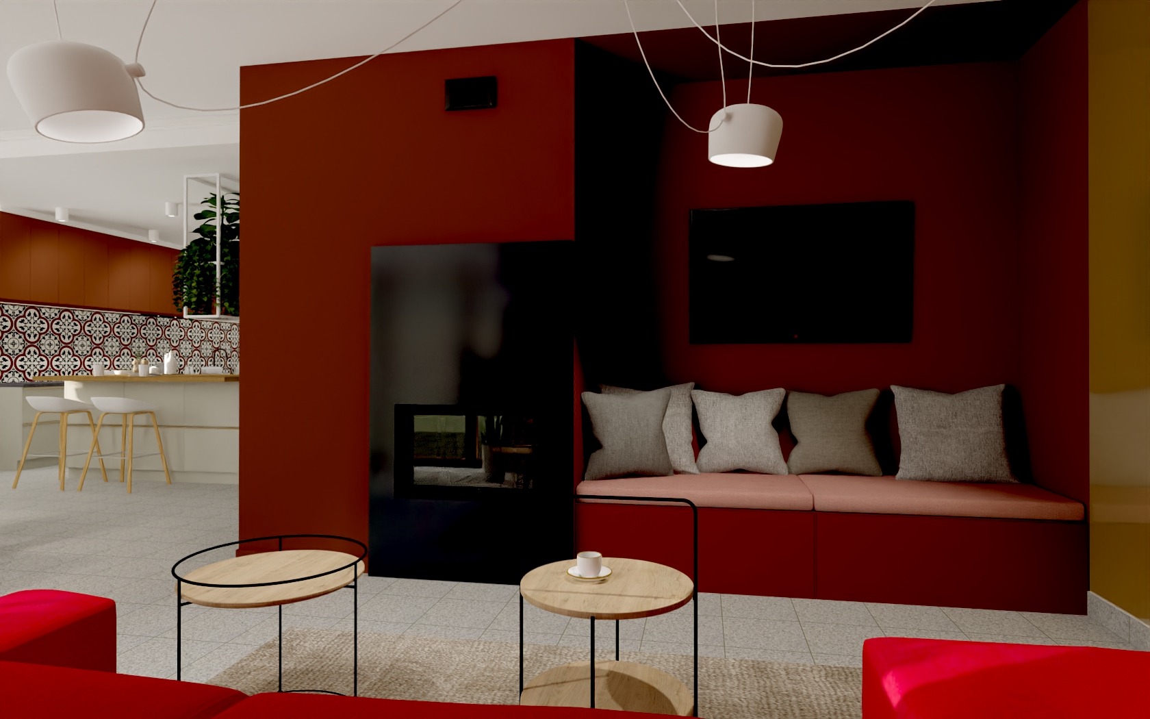 Wnętrze salonu w Rybniku z czerwonymi ścianami, czarnym kominkiem i płaskim telewizorem. Jasna kuchnia widoczna w tle, dwie okrągłe drewniane ławy i sofa z szarymi poduszkami.