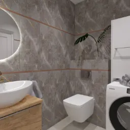 Nowoczesna łazienka z umywalką nablatową na drewnianej szafce, okrągłym lustrem z podświetleniem LED, toaletą wiszącą i pralką z szafką nad nią, wykończona płytkami imitującymi marmur z akcentami...