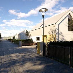 Paulina Gogacz-Formella archiPAGO - Wizualizacja osiedla domów jednorodzinnych w nowoczesnym stylu z elementami drewna, z chodnikiem z kostki brukowej i oświetleniem ulicznym. Słoneczny dzień.