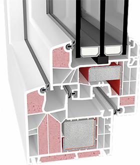 Przekrój profilu okna PCV z widoczną wielokomorową konstrukcją, uszczelkami i wypełnieniem termoizolacyjnym.