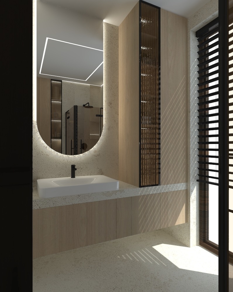 Nowoczesna łazienka z owalnym lustrem podświetlonym LED, białą umywalką nablatową na szafce z drewnopodobnym fornirem i wysoką szafką z ażurowymi drzwiami oraz oknem z żaluzjami.