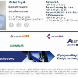 Wizytówka firmy Aureus z danymi kontaktowymi, logo i informacjami o leasingu i kredytach samochodowych oraz na maszyny, w tle fragment zdjęcia samochodu.