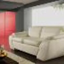 Nowoczesna szafa wnękowa z przesuwnymi drzwiami w kolorze intensywnej czerwieni, widoczna z perspektywy salonu z jasną sofą i stolikiem kawowym.