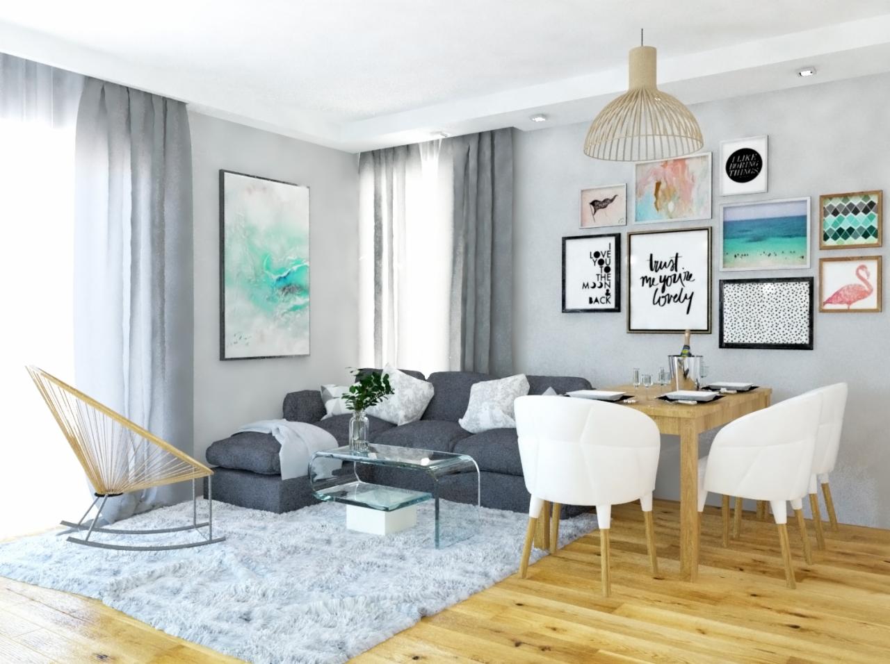 Jasne wnętrze salonu z szarą sofą, szklanym stolikiem kawowym, drewnianym stołem jadalnym i białymi krzesłami na drewnianej podłodze; na ścianie galeria obrazków w ramkach.