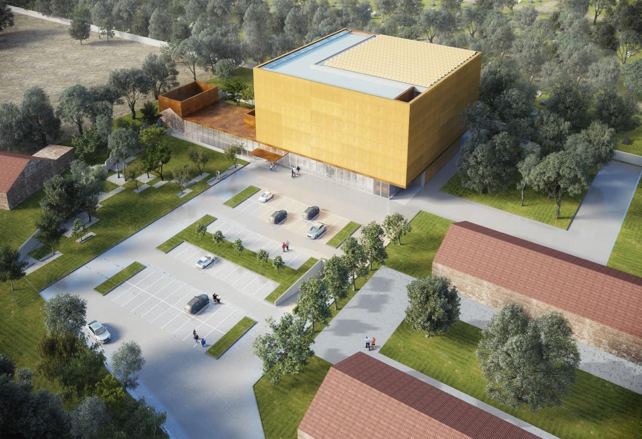 Wizualizacja budynku usługowego z parkingiem, otoczonego zielenią, z widoczną elewacją w odcieniach złota i szklanymi elementami fasady.