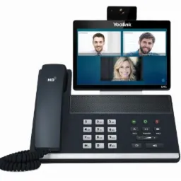 Telefon IP z ekranem wyświetlającym wideokonferencję z trzema osobami.