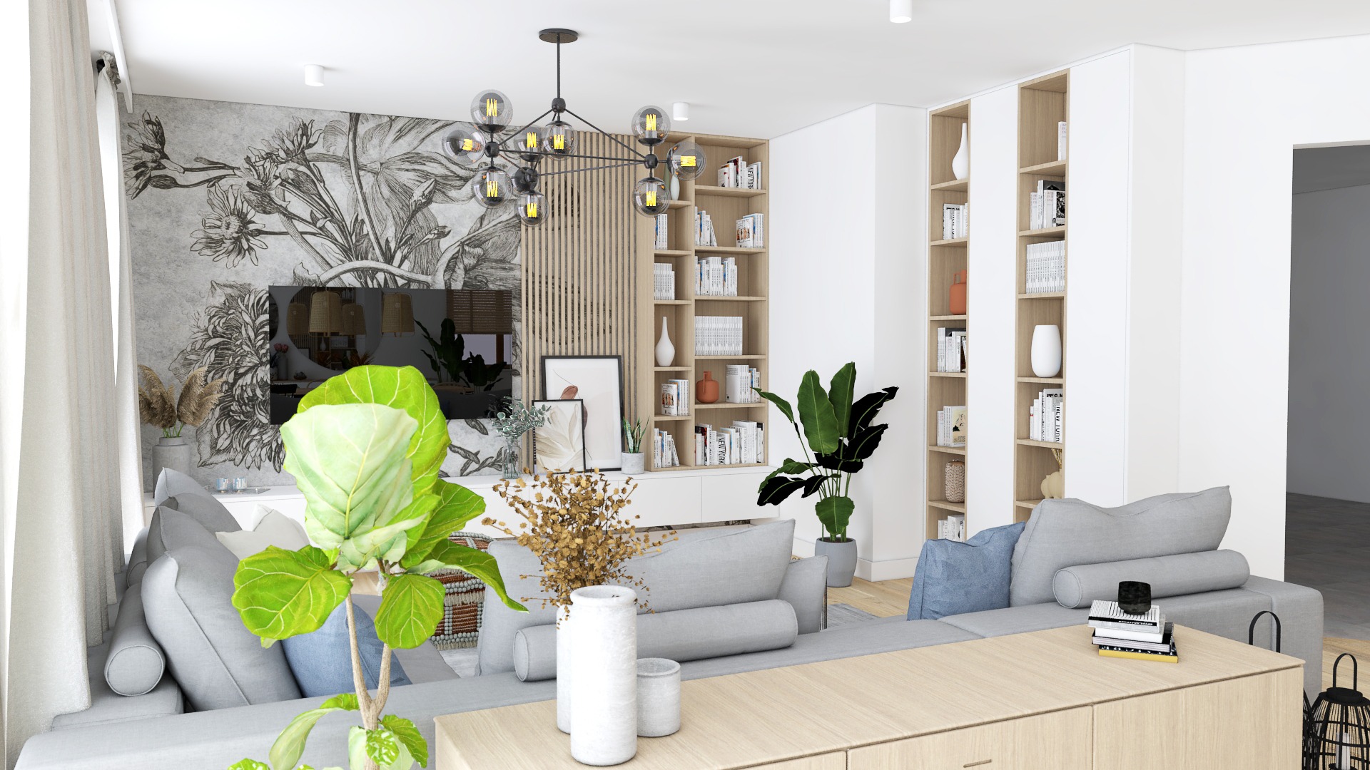 Jasny salon z szarą sofą modułową, drewnianą komodą, regałami z książkami, lampą w stylu industrialnym i tapetą w kwiaty, doświetlony naturalnym światłem.