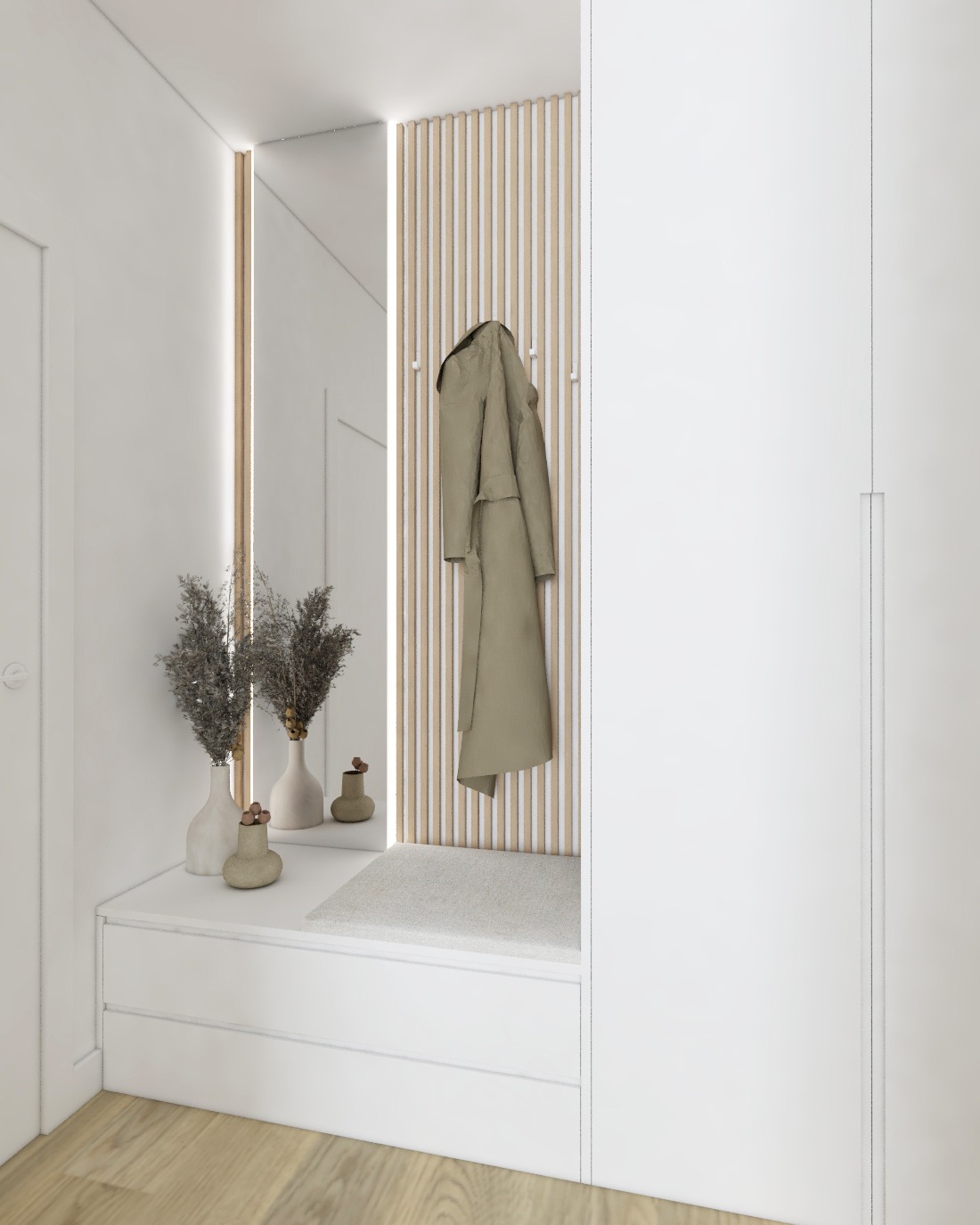 Minimalistyczny przedpokój z białymi meblami, lustrem z podświetleniem LED, dekoracyjnymi wazonami z suszem i beżowym płaszczem wiszącym na drewnianym panelu ściennym z haczykami.