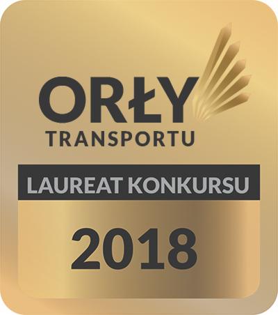Złota plakietka z napisem 'Orły Transportu' i 'Laureat Konkursu 2018', symbolizująca nagrodę w branży transportowej.