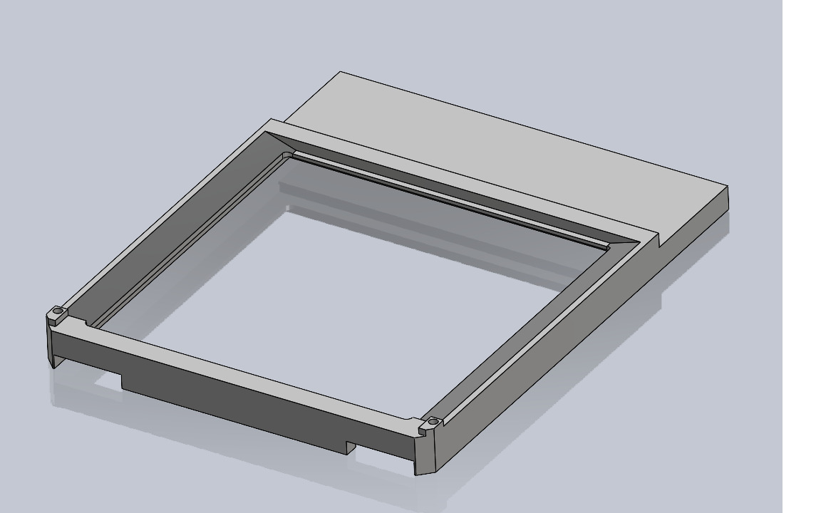 CAD model of a rectangular frame with a raised section, showing detailed edges and screw holes, rendered on a plain background.
