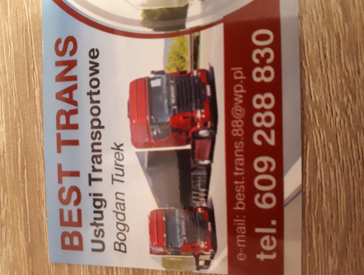 Wizytówka firmy transportowej Best Trans z Turek, prezentująca czerwone ciężarówki i dane kontaktowe: adres e-mail i numer telefonu.