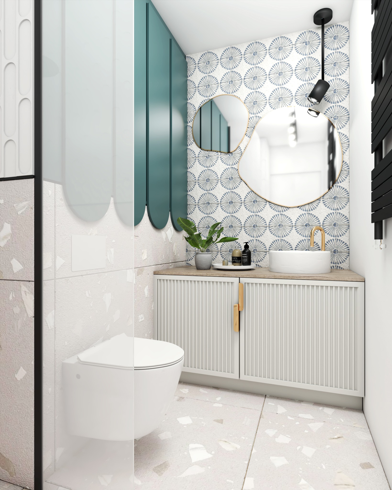Nowoczesna łazienka z wiszącą toaletą, umywalką na szafce z ryflowanymi frontami i lustrem o nieregularnym kształcie na tle wzorzystej tapety.