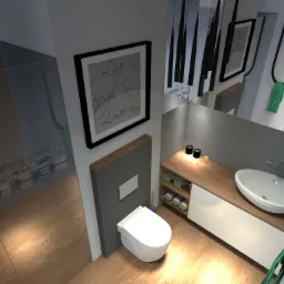 Nowoczesna łazienka z drewnianą podłogą, umywalką nablatową i toaletą w zabudowie, oświetlona ciepłym światłem, z dekoracyjnym obrazem na ścianie i szklaną kabiną prysznicową.