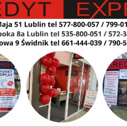 Fasada biura Kredyt Expert z czerwonymi balonami, informacją o kredytach i punktem opłat, widoczne numery telefonów i adresy w Lublinie i Świdniku.