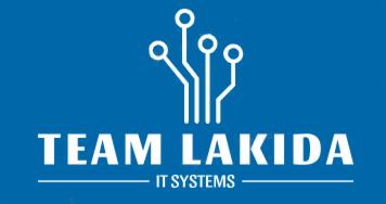 Logo firmy Team Lakida IT Systems z Gdyni na niebieskim tle, przedstawiające stylizowany układ scalony.
