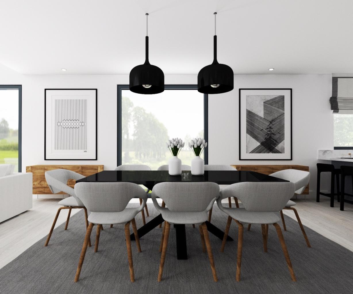 Nowoczesna jadalnia z czarnym stołem, szarymi krzesłami na drewnianych nogach i dwiema czarnymi lampami wiszącymi, uzupełniona minimalistycznymi grafikami w czarnych ramach.