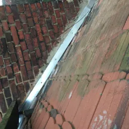 Obróbki wokół komina.