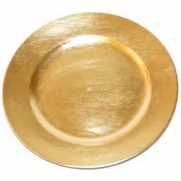 Okrągła, złota podkładka pod talerz z delikatną teksturą imitującą przetarcia farby.