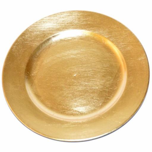 Okrągła, złota podkładka pod talerz z delikatną teksturą imitującą przetarcia farby.