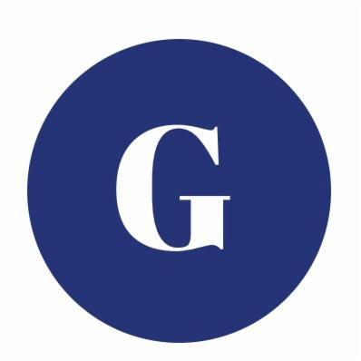 Logo z białą literą 'G' na granatowym tle w kształcie koła.