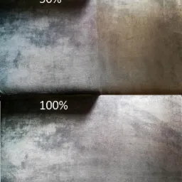 Porównanie: połowa tapicerki meblowej wyczyszczona (50%), druga połowa przed czyszczeniem (100%).
